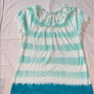 A blue and white ruffle top